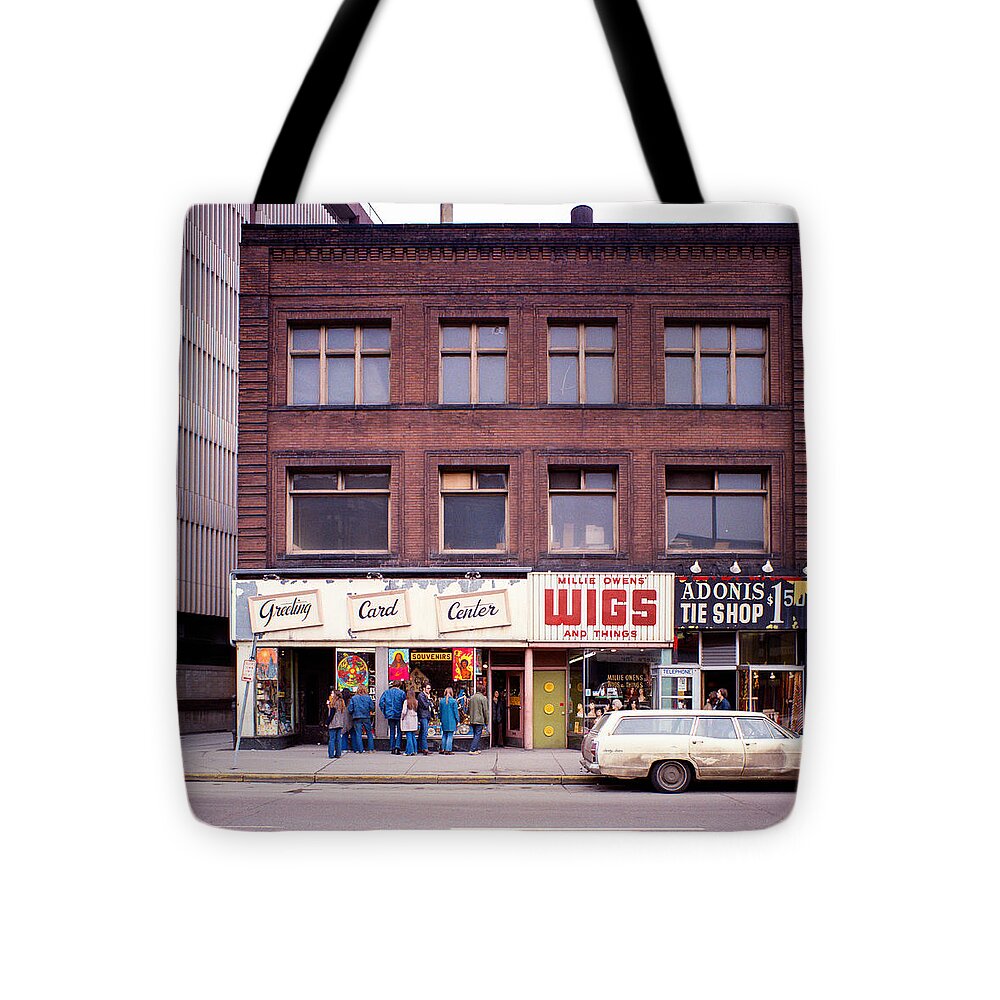 Downtown_printed Tote Bag featuring the photograph Something's going on at the Greeting Card Center. by Mike Evangelist