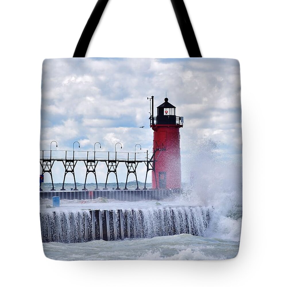 Michigan Tote Bag featuring the photograph South Haven Lighthouse by Nicole Lloyd