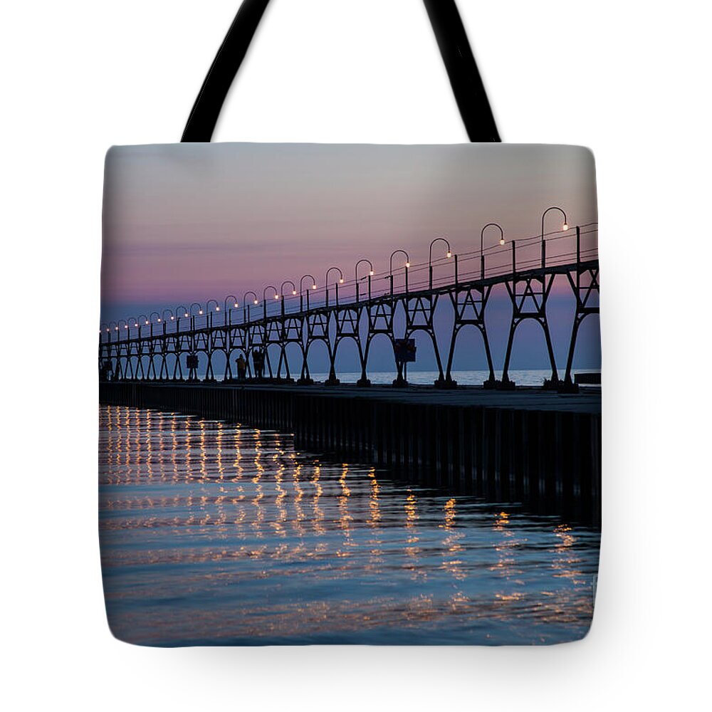 South Haven Tote Bag featuring the photograph South Haven Lighthouse by Timothy Johnson