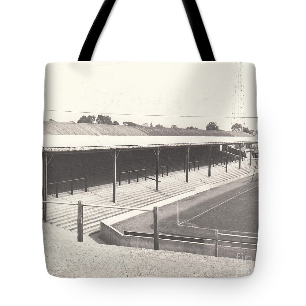  Tote Bag featuring the photograph Southend United - Roots Hall - North Stand 1 - BW - 1960s by Legendary Football Grounds