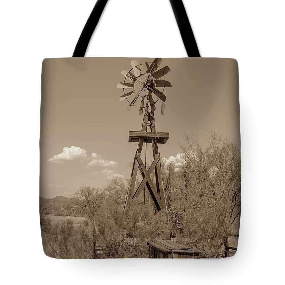Windmill Tote Bag featuring the photograph Southwest windmill by Darrell Foster