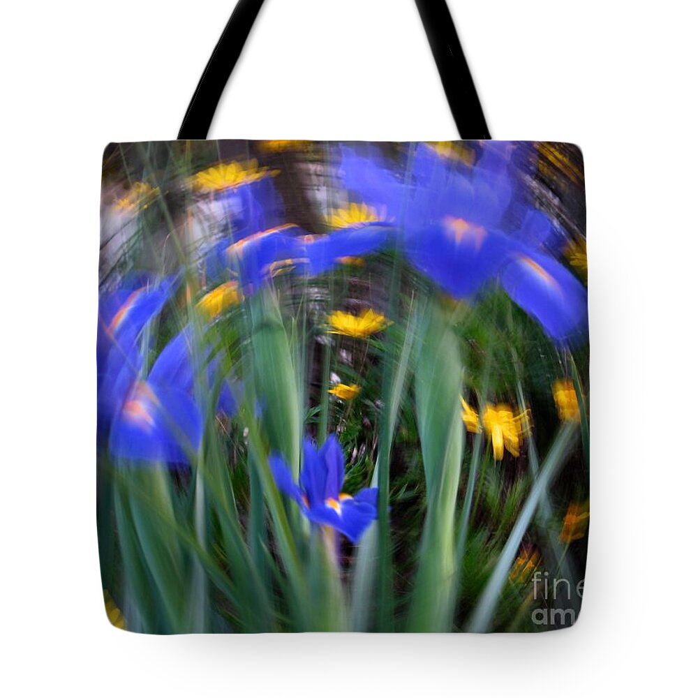 Iris Tote Bag featuring the photograph Spinning Iris by James B Toy
