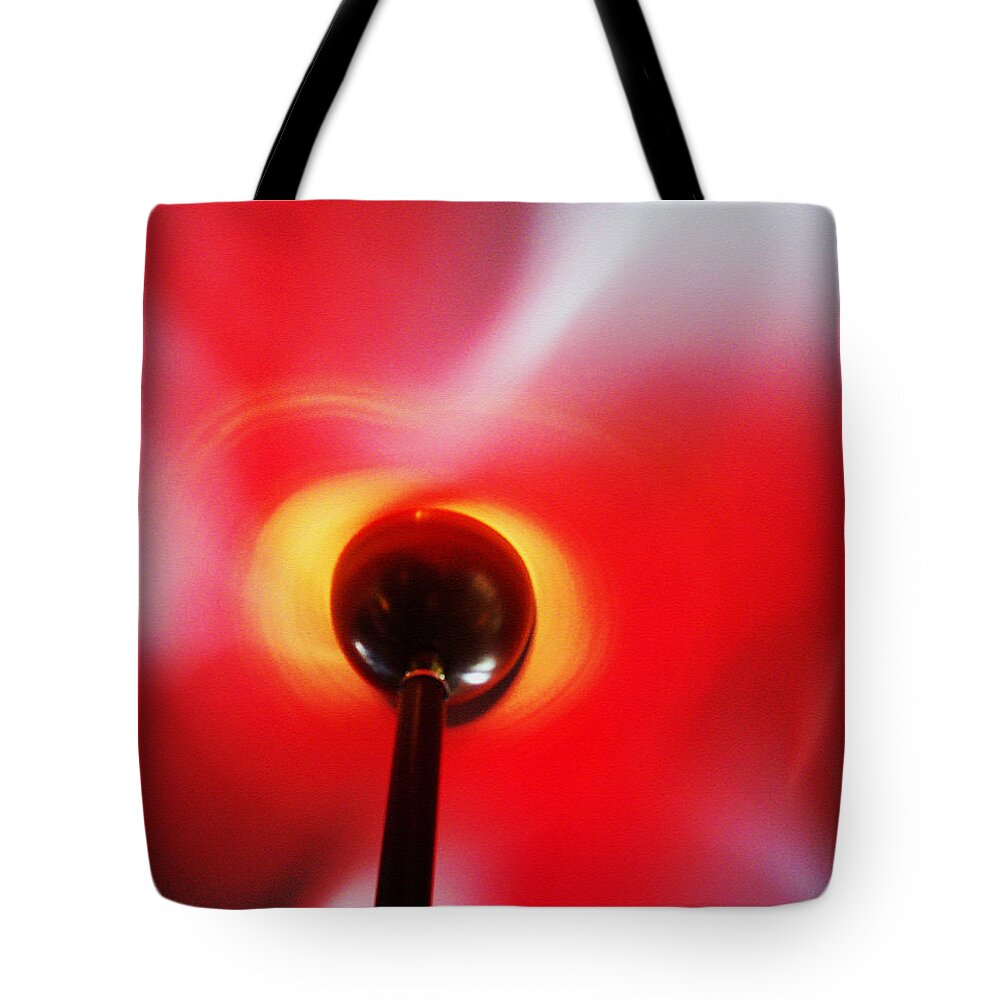 Science Experiment Tote Bag featuring the photograph Spinning by Shawna Rowe