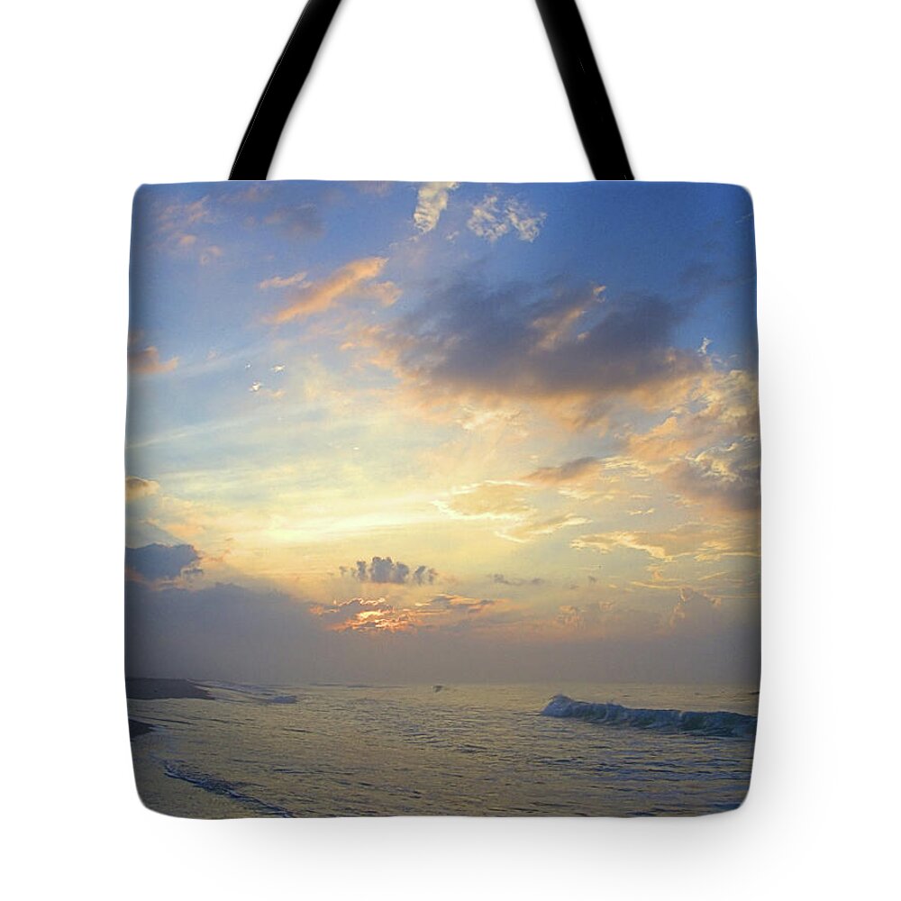 Seas Tote Bag featuring the photograph Spring Sunrise by Newwwman