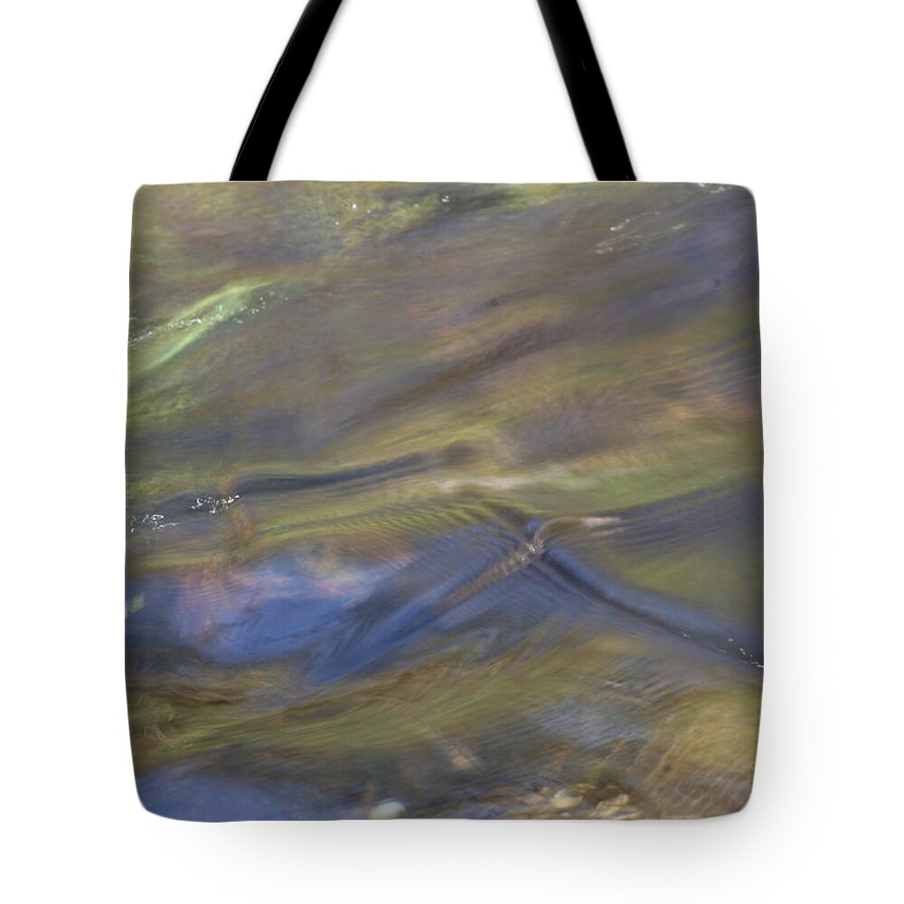 Spring Turbulence Tote Bag featuring the photograph Spring Turbulence by Dylan Punke