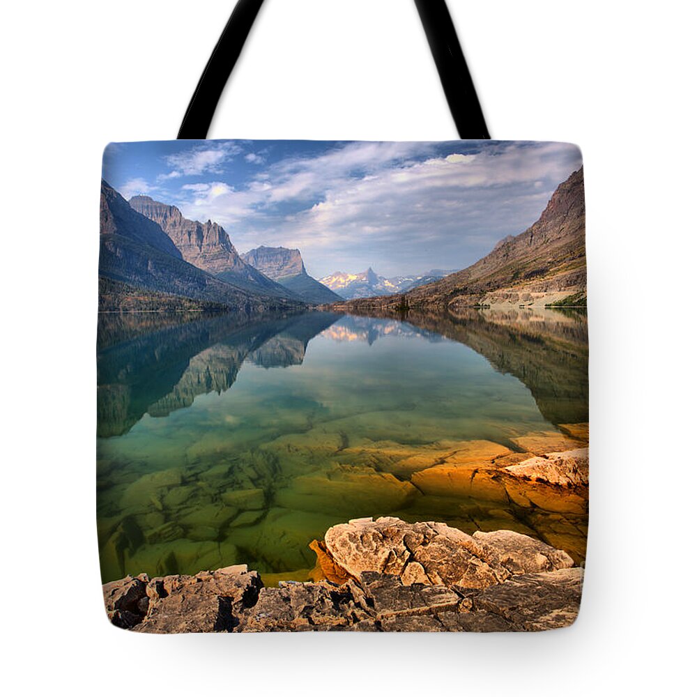 St Mary Lake Tote Bag featuring the photograph St Mary Emerald Green Waters by Adam Jewell