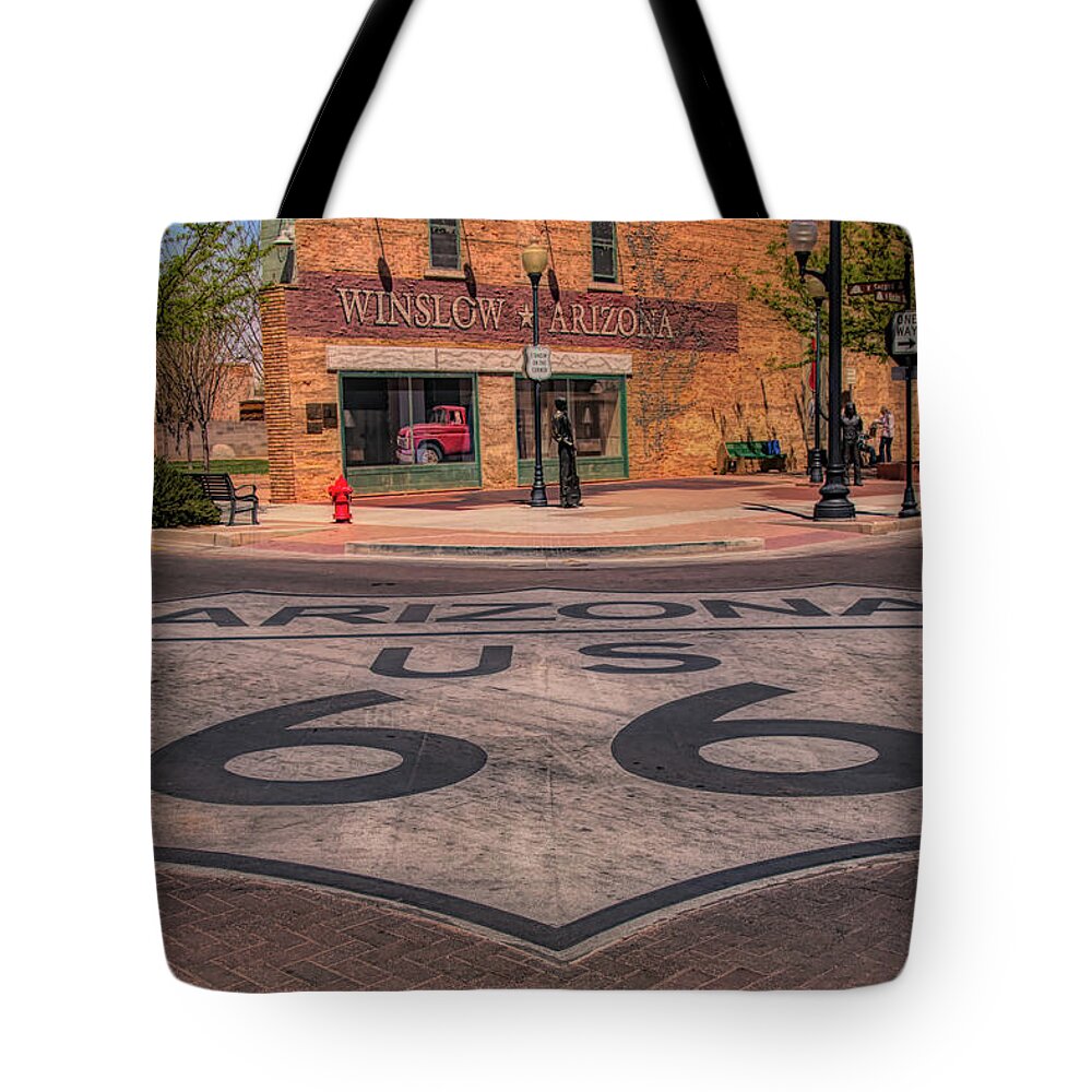 Winslow Arizona Tote Bag featuring the photograph Standin on the corner by Jeff Folger