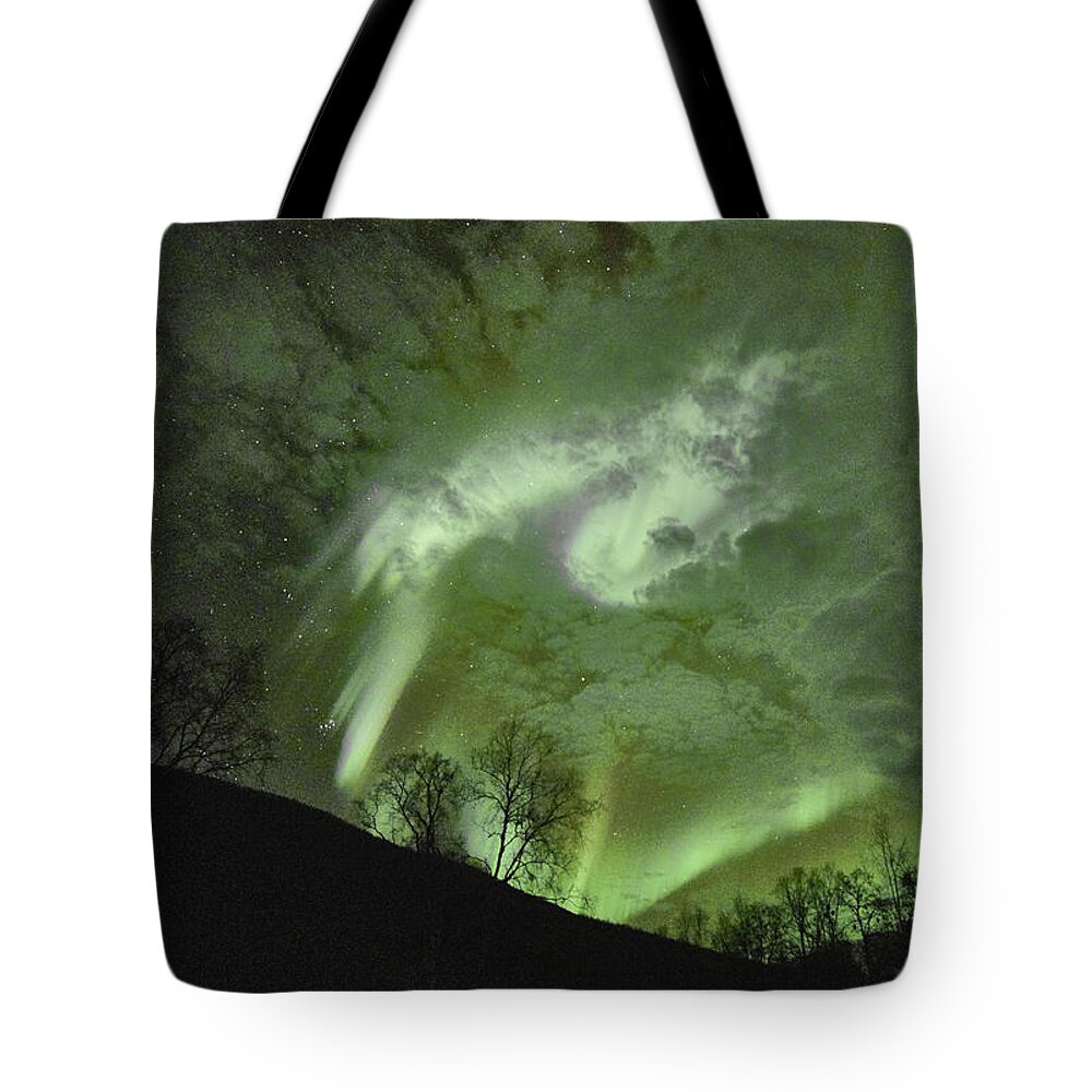 Sky Tote Bag featuring the photograph Stars, Clouds and Northern Lights by Pekka Sammallahti