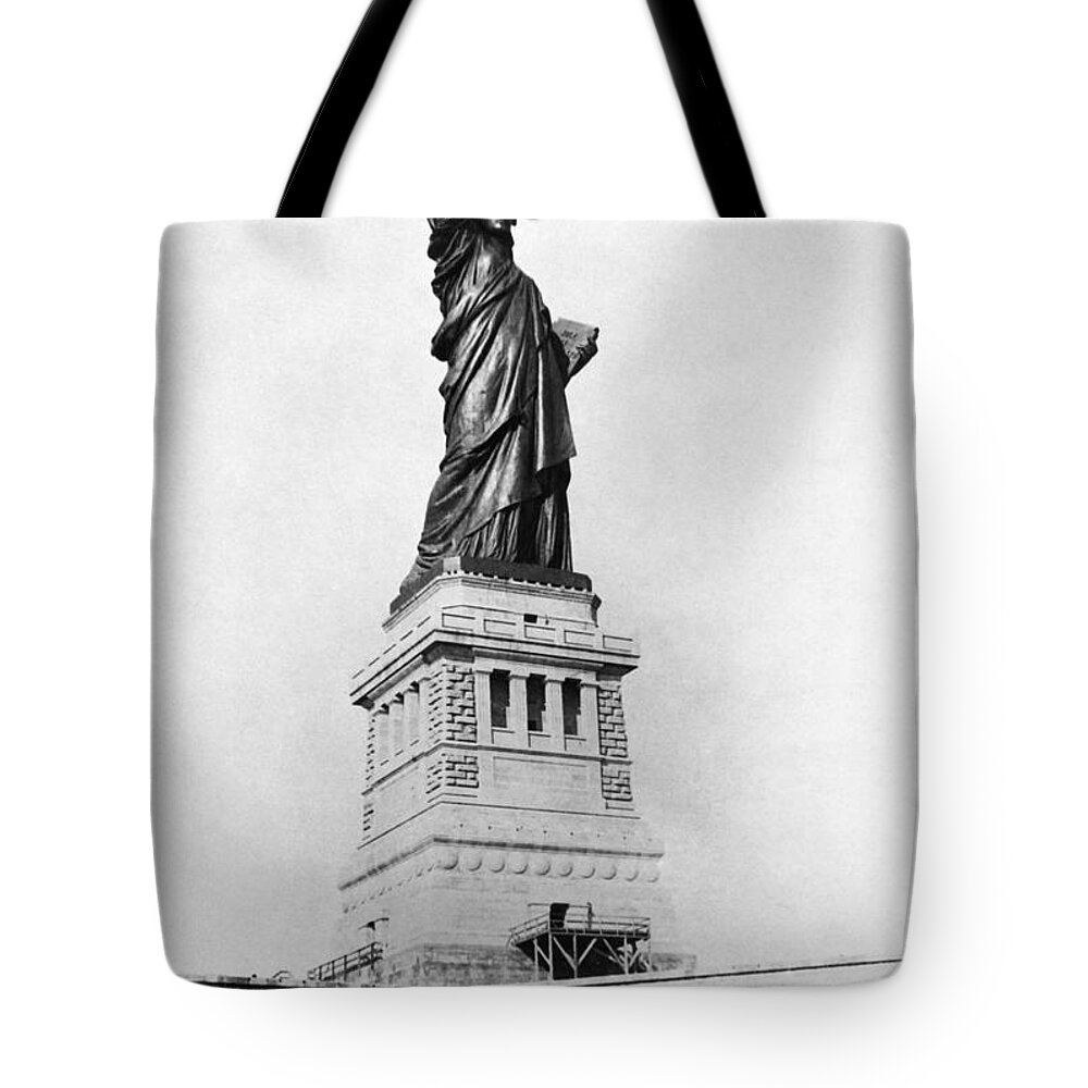 1890 Tote Bag featuring the photograph STATUE OF LIBERTY, c1890 by Granger