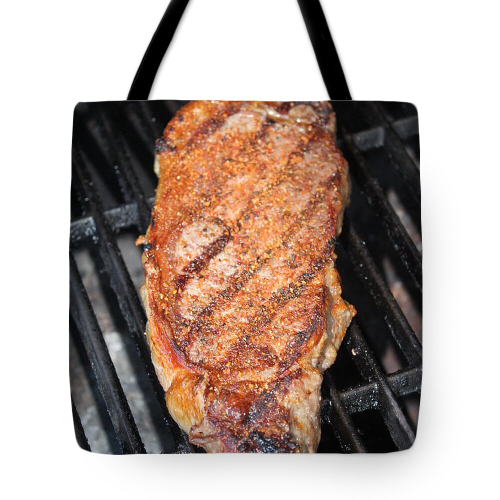 Grilling Tote Bag featuring the photograph Steak by Henrik Lehnerer