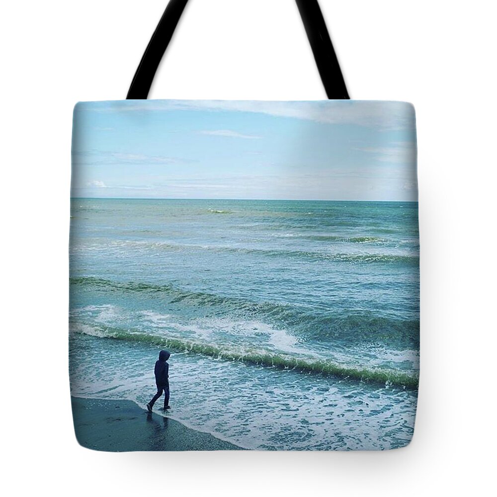 Steppingout Tote Bag featuring the photograph Stepping Into The Unknown by Aleck Cartwright