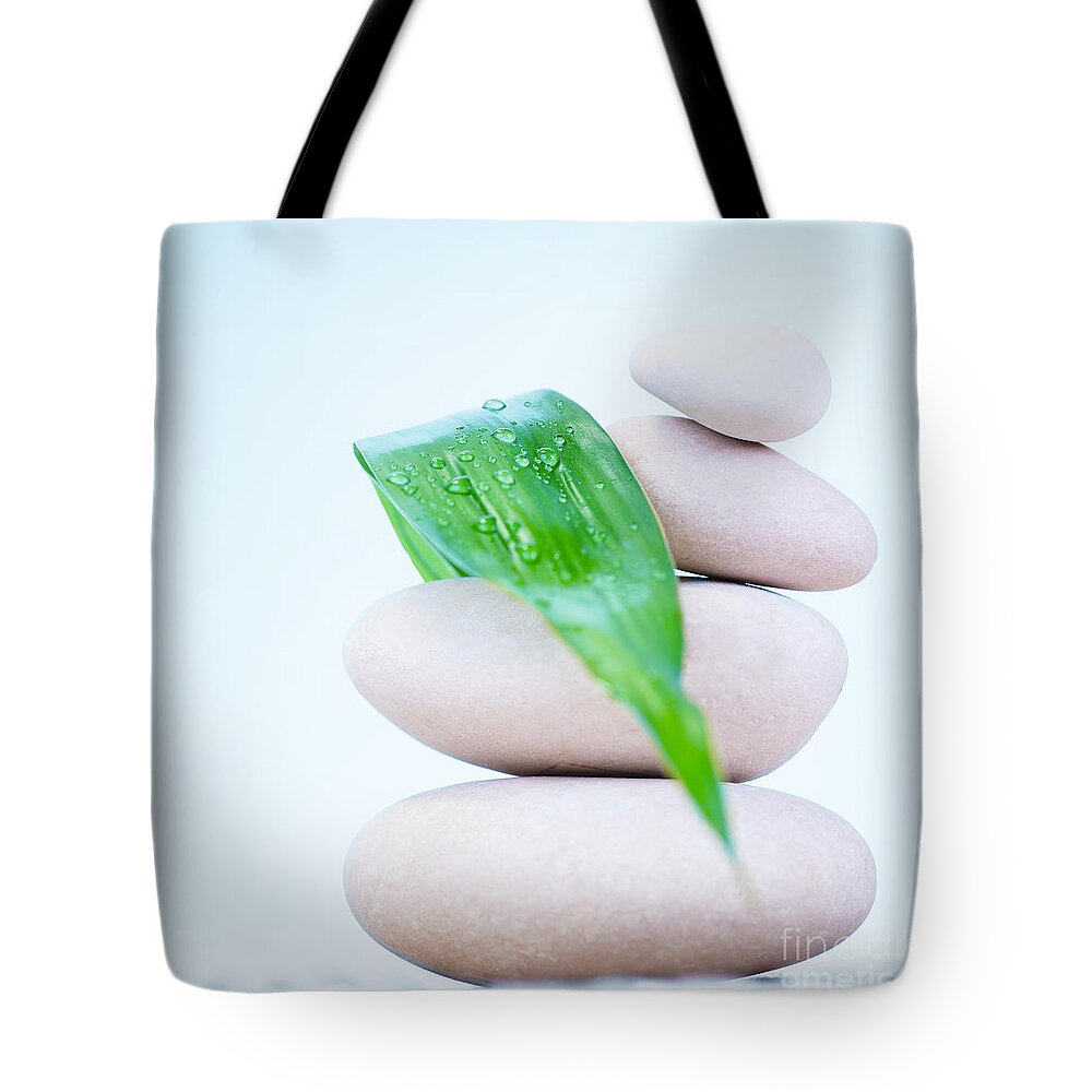 Abstract Tote Bag featuring the photograph Still life of spa stones by Anna Om