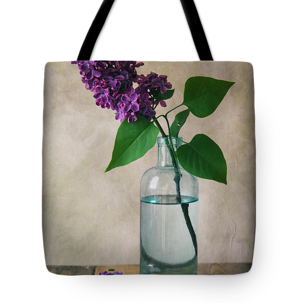 Lilac Tote Bag featuring the photograph Still life with fresh lilac by Jaroslaw Blaminsky