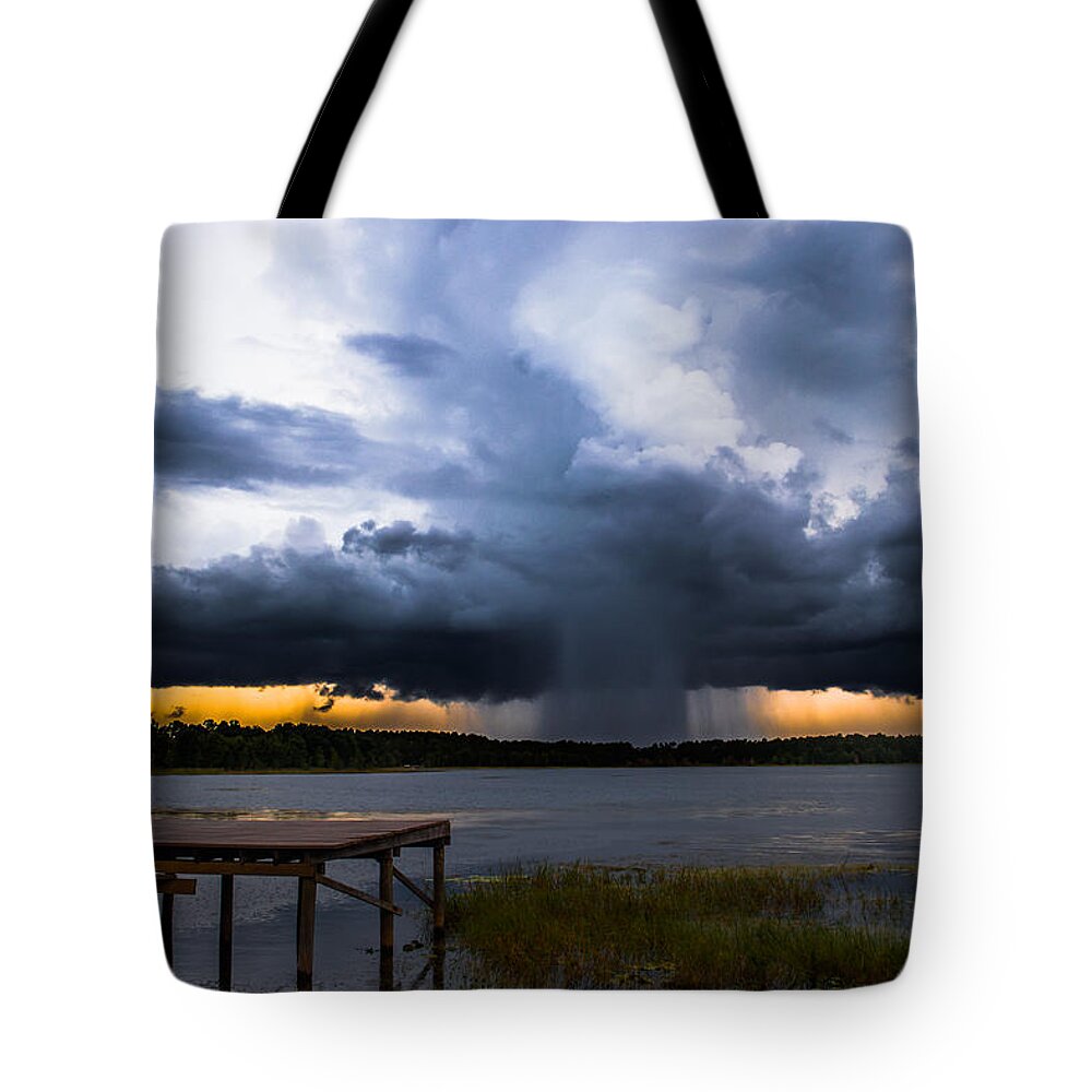 Sunset Tote Bag featuring the photograph Storm at Sundown by Parker Cunningham