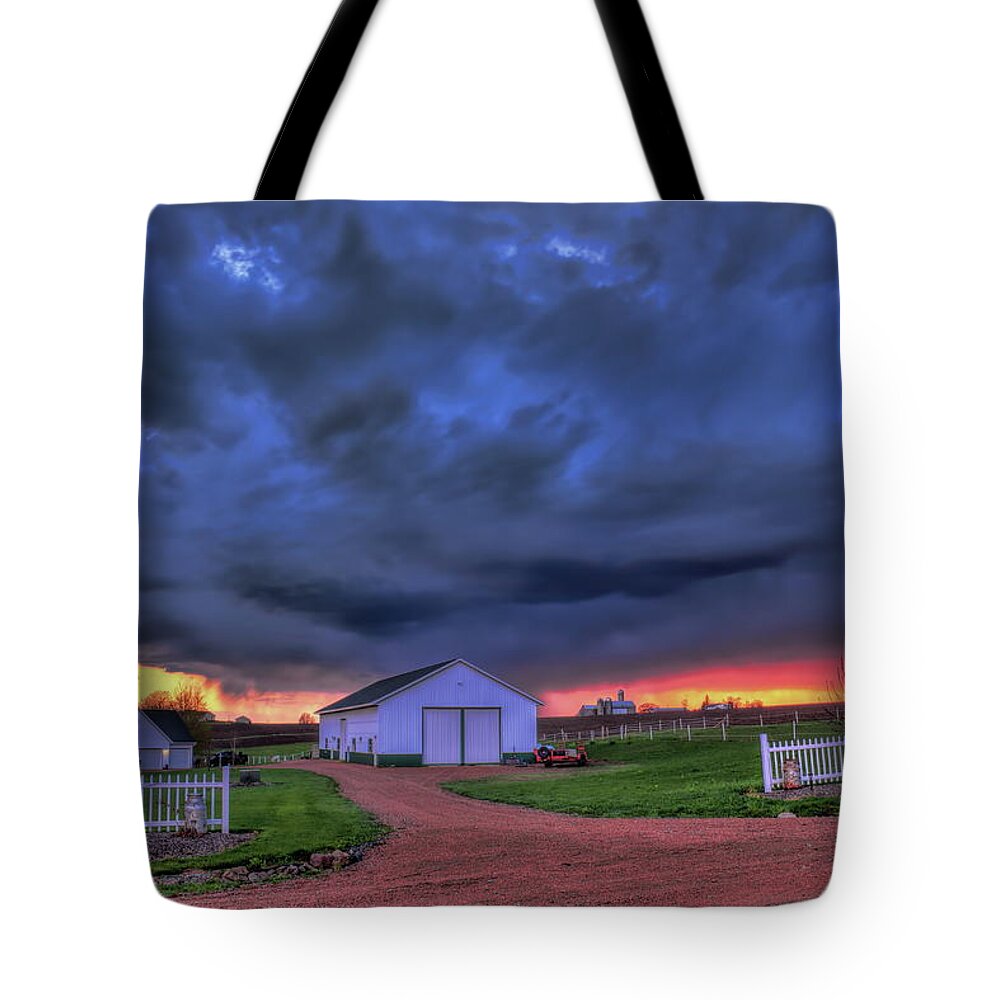 Weather Tote Bag featuring the photograph Storm At Sunset by Dale Kauzlaric