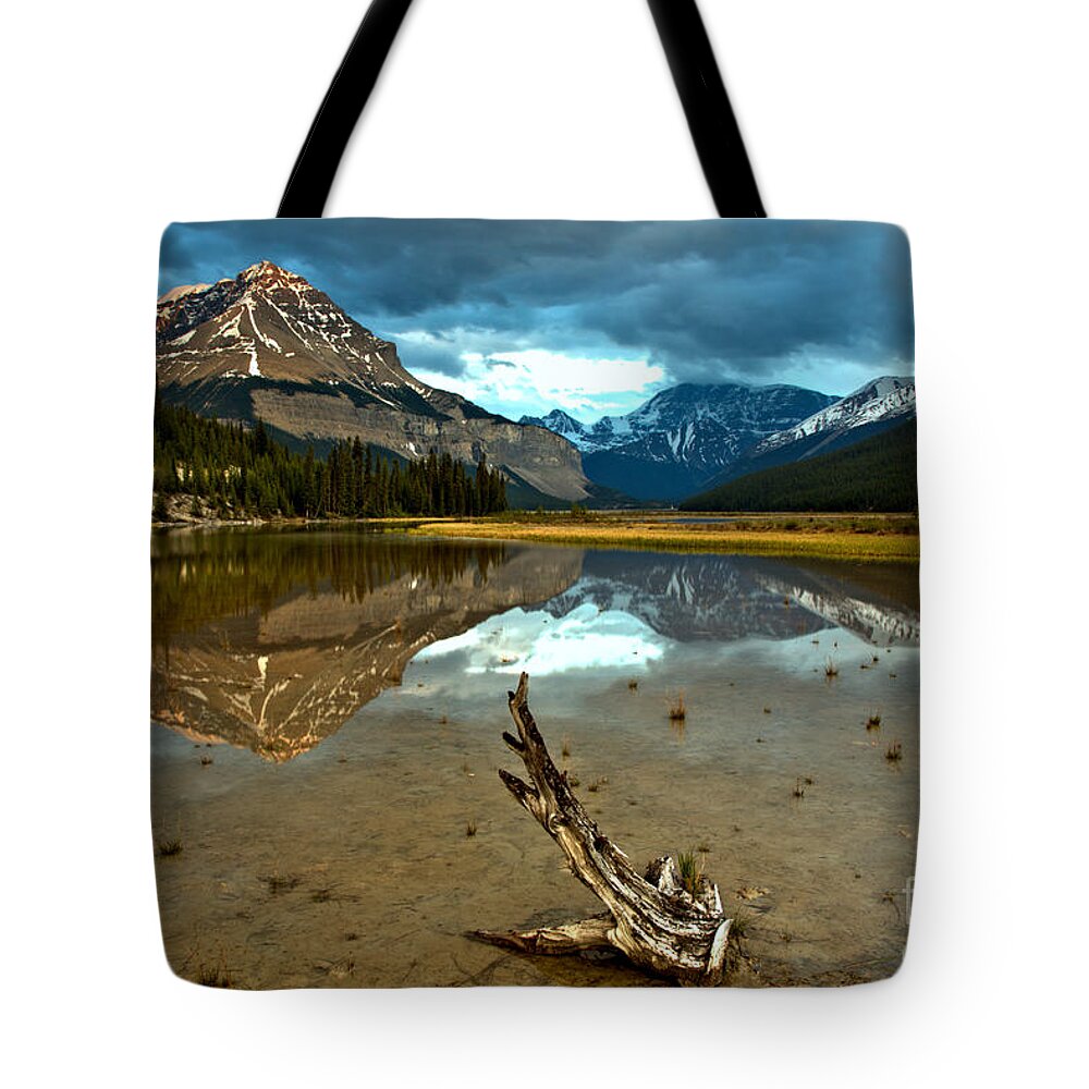 Beauty Creek Tote Bag featuring the photograph Storm Clouds And Mt. Chephren Reflections by Adam Jewell