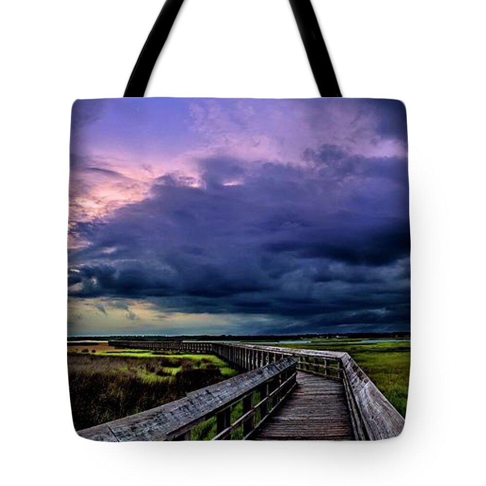 Surf City Tote Bag featuring the photograph Storm Clouds by DJA Images