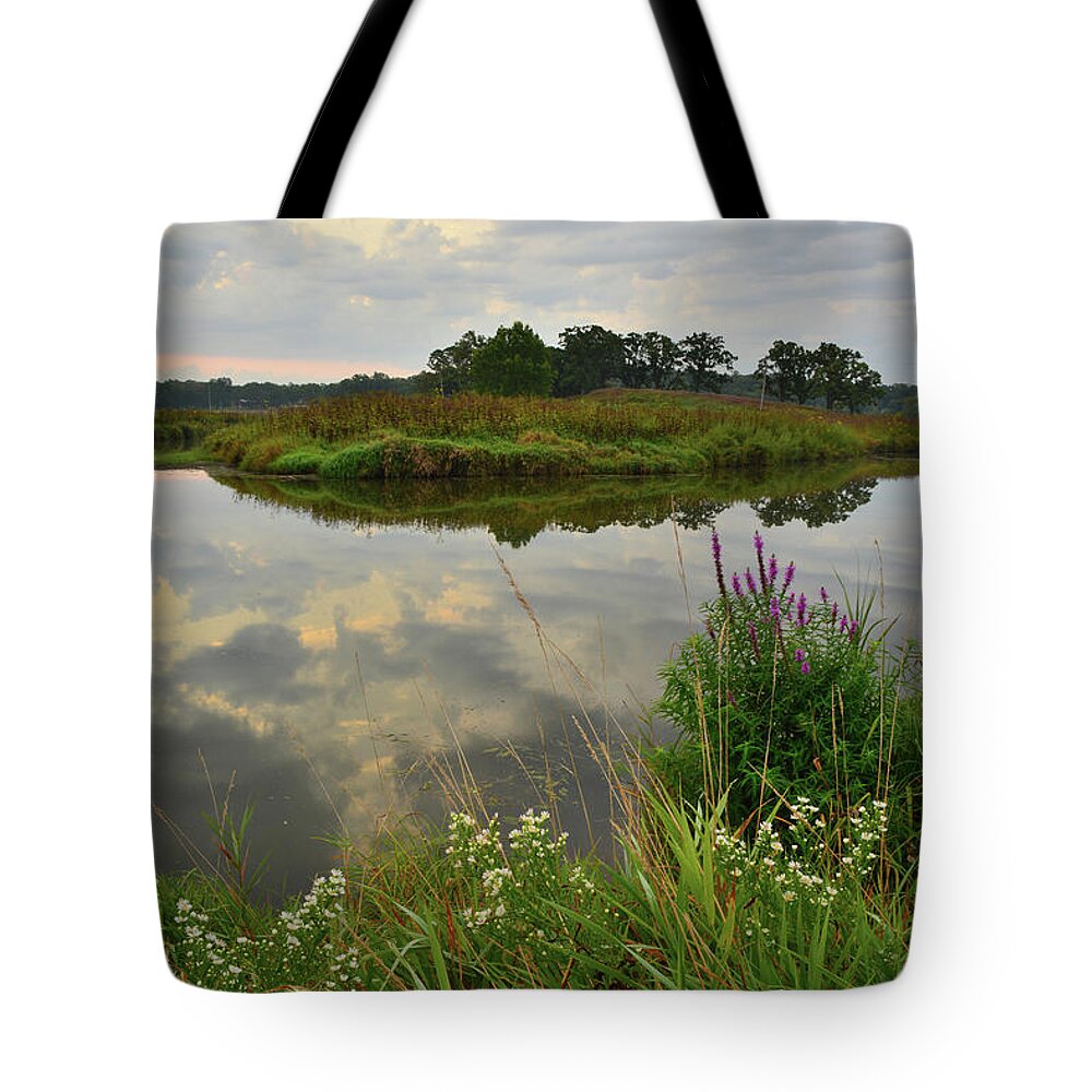 Glacial Park Tote Bag featuring the photograph Storm Clouds Reflect in the Nippersink by Ray Mathis