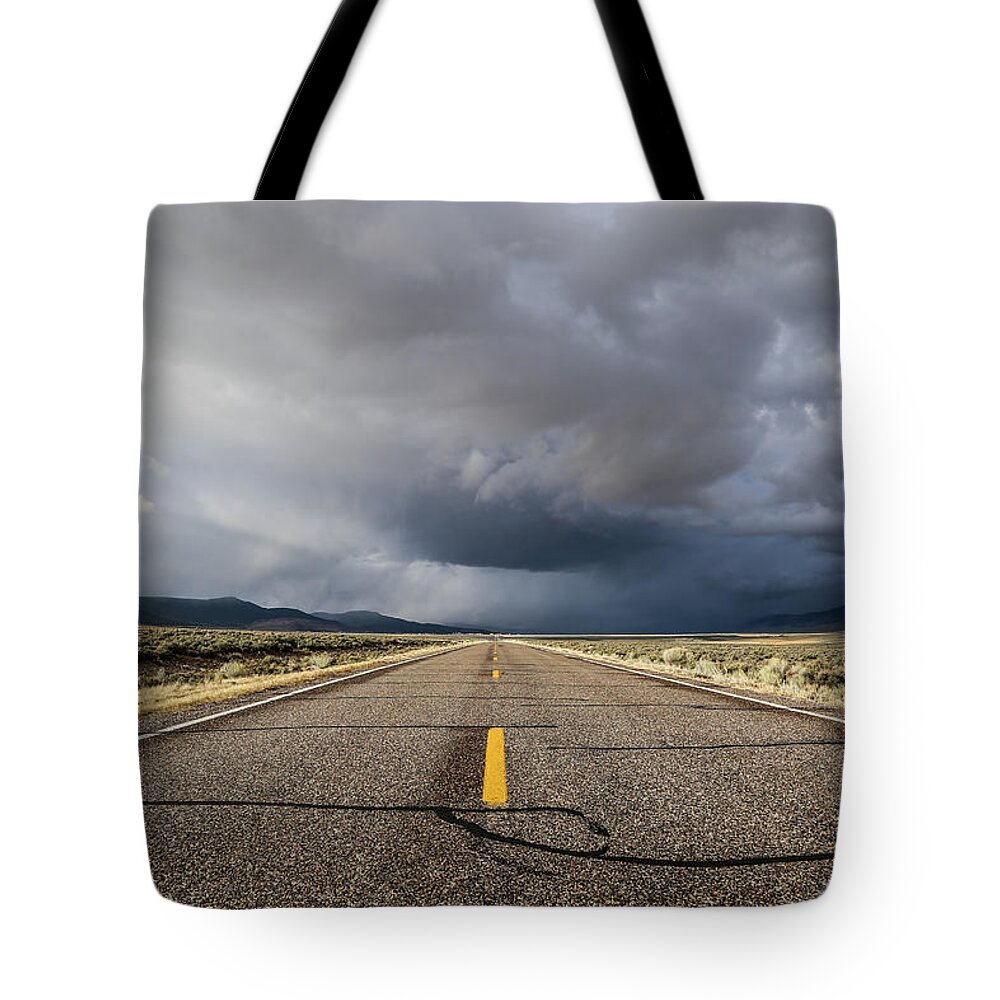 Usa Tote Bag featuring the photograph Storm on a Utah road by Alberto Zanoni