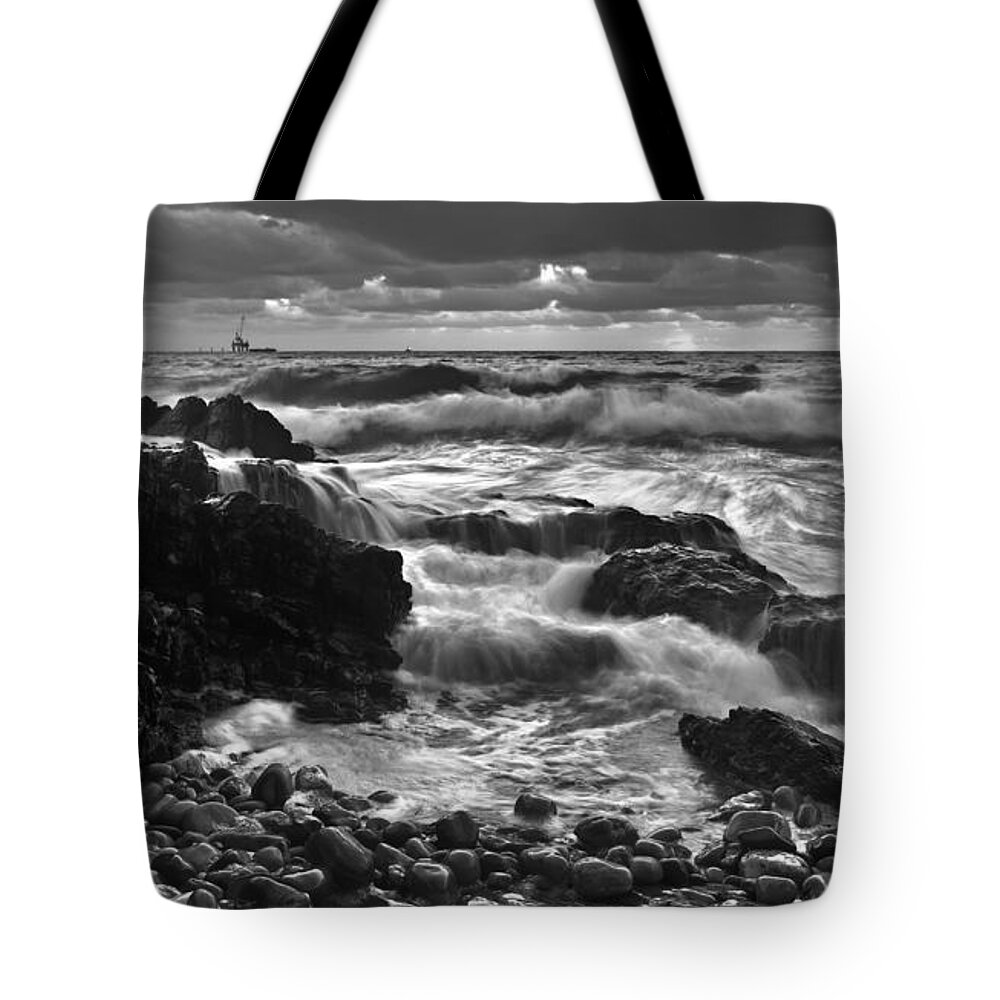 Storm Surge Hallett Cove Adelaide South Australia Seascape Black And White Waves Breaking Rocky Coast Coastline Grey Cloudy Overcast Tote Bag featuring the photograph Storm Surge by Bill Robinson