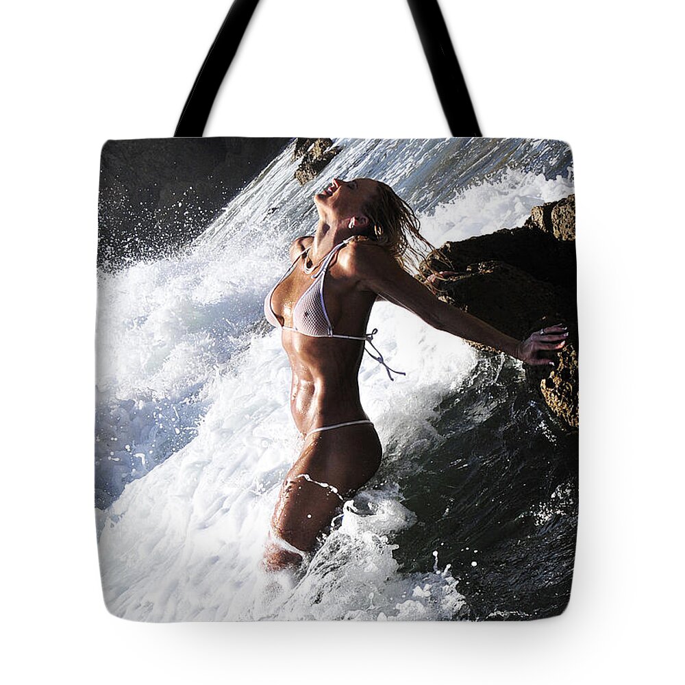 Artistic Tote Bag featuring the photograph Storming the beach by Robert WK Clark