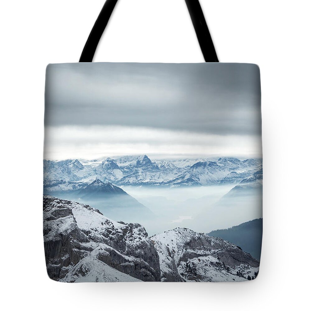 Adventure Tote Bag featuring the photograph Stormy Mountainscape. Mount Pilatus, Switzerland by Rick Deacon