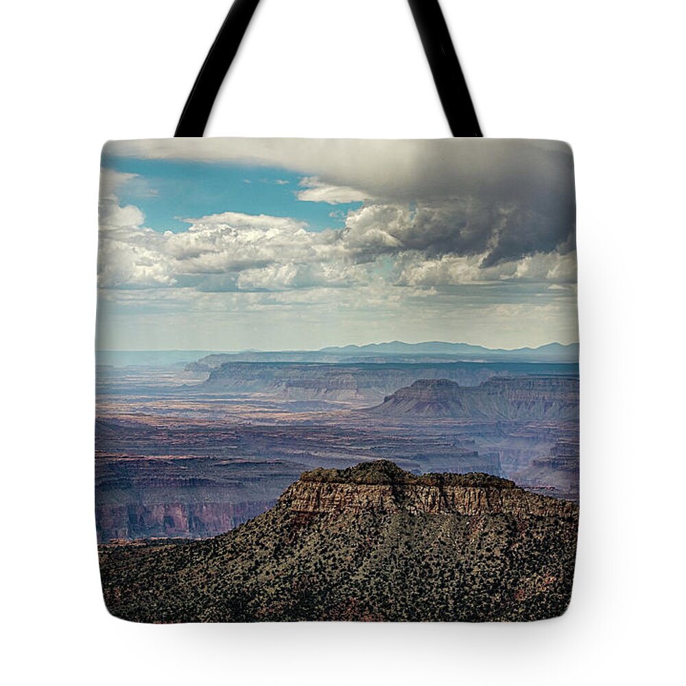 Canyon Tote Bag featuring the photograph Stormy sky past Bridgers Knoll by Gaelyn Olmsted