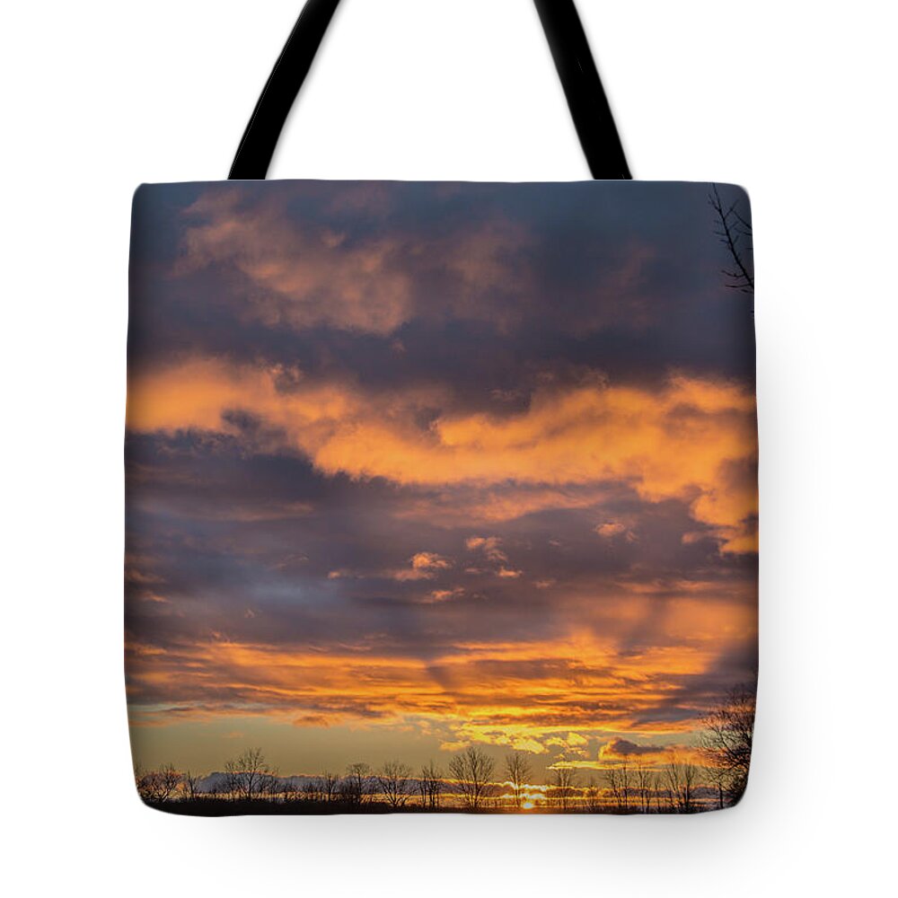 Cheryl Baxter Photography Tote Bag featuring the photograph Stormy Sky Sunrise by Cheryl Baxter