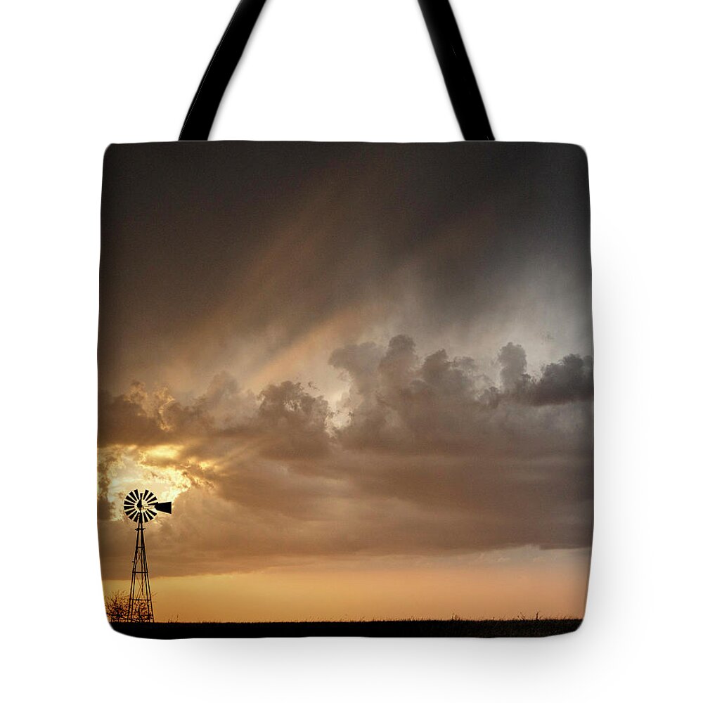 Kansas Tote Bag featuring the photograph Stormy Sunset and Windmill 06 by Rob Graham