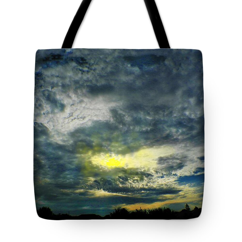 Sunset Tote Bag featuring the photograph Stormy Sunset by Mark Blauhoefer
