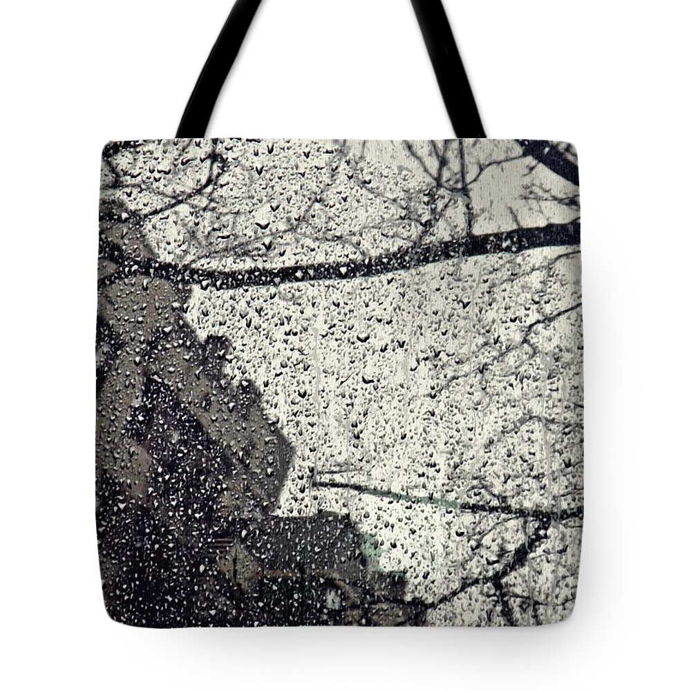 Building Tote Bag featuring the photograph Stormy Weather by Sarah Loft