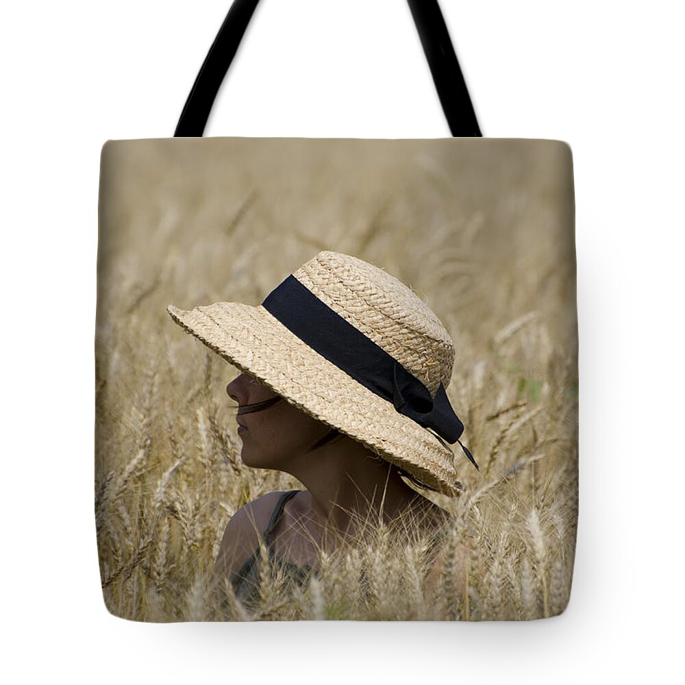 Woman Tote Bag featuring the photograph Straw hat by Mats Silvan