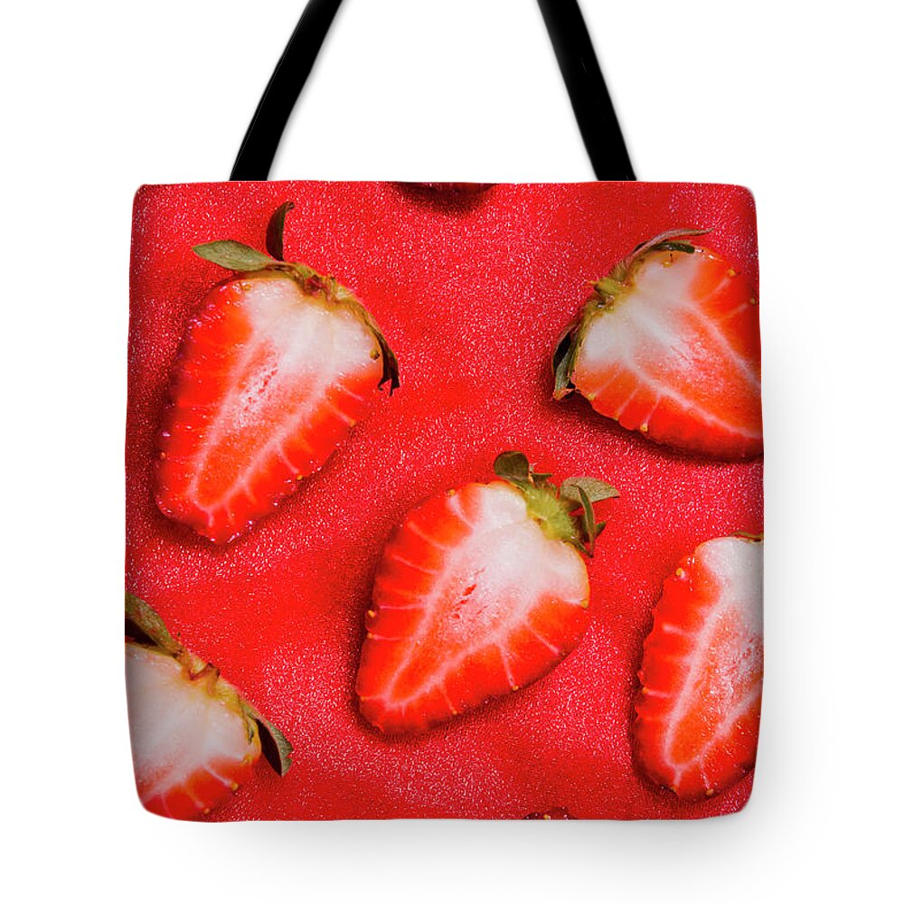 Food Tote Bag featuring the photograph Strawberry slice food still life by Jorgo Photography