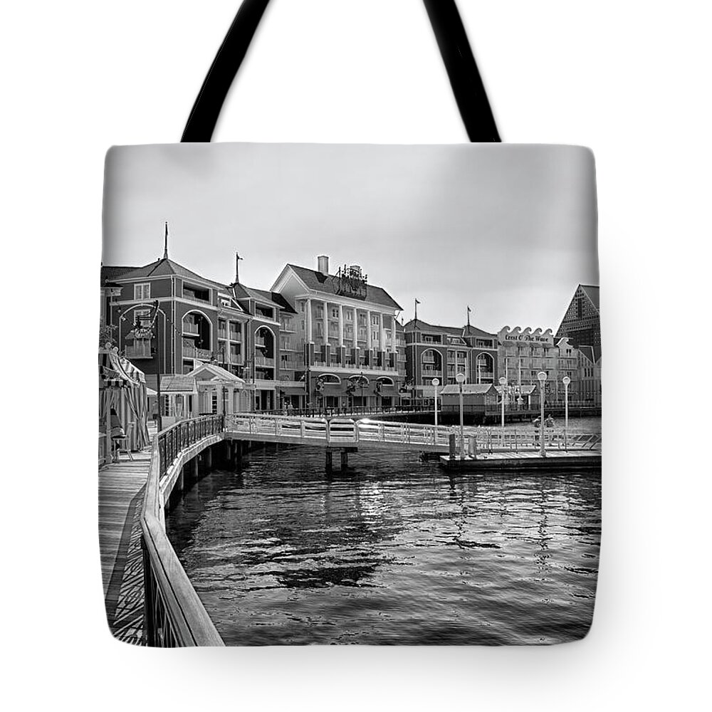Black And White Tote Bag featuring the photograph Strolling on the boardwalk in Black and White Walt Disney World MP by Thomas Woolworth