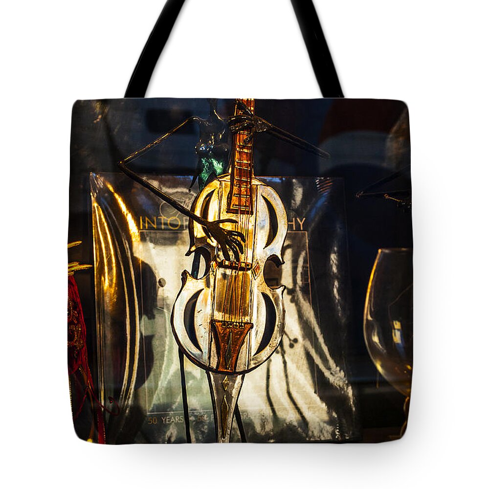 Statue Tote Bag featuring the photograph Strumming Guitar by Frances Ann Hattier