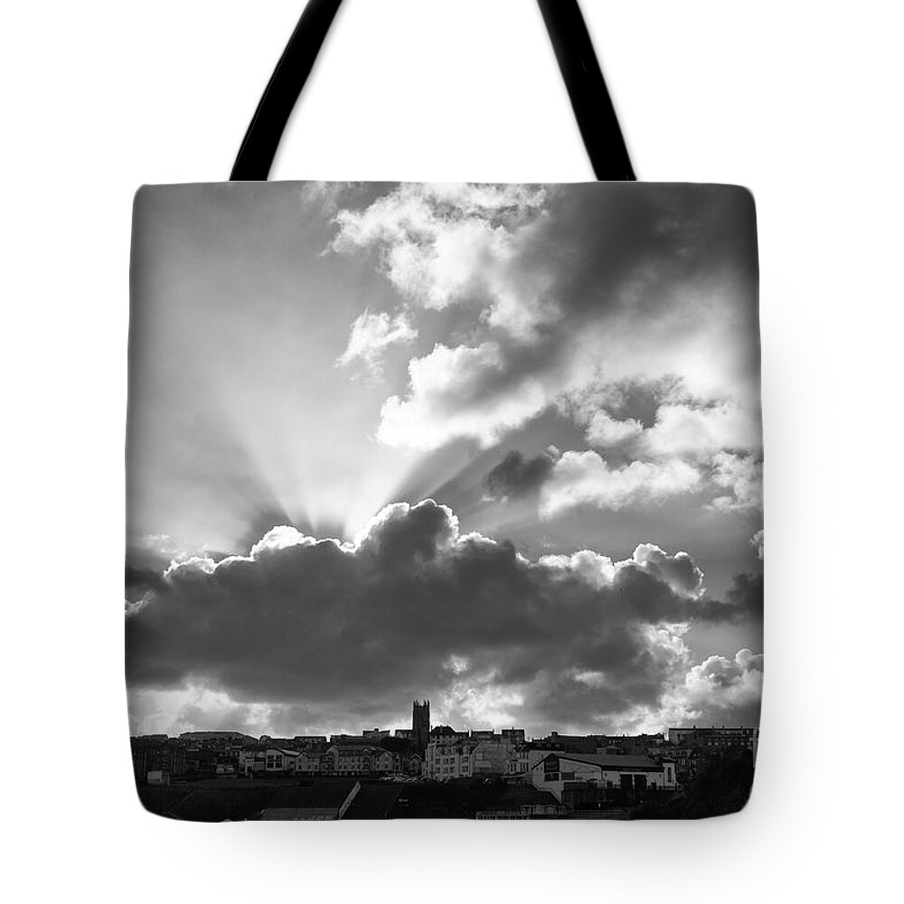 Sun Tote Bag featuring the photograph Sun Beams over Church by Nicholas Burningham