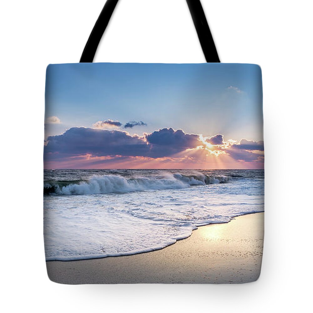 Horizon Over Water Tote Bag featuring the photograph Sun Rays and Waves by John Randazzo