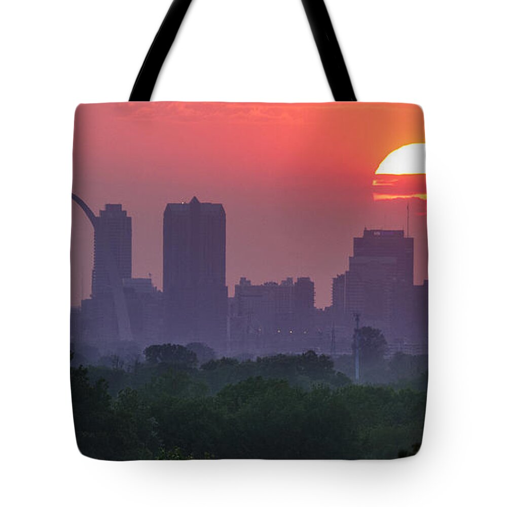 St Louis Tote Bag featuring the photograph Sun setting over St Louis by Garry McMichael