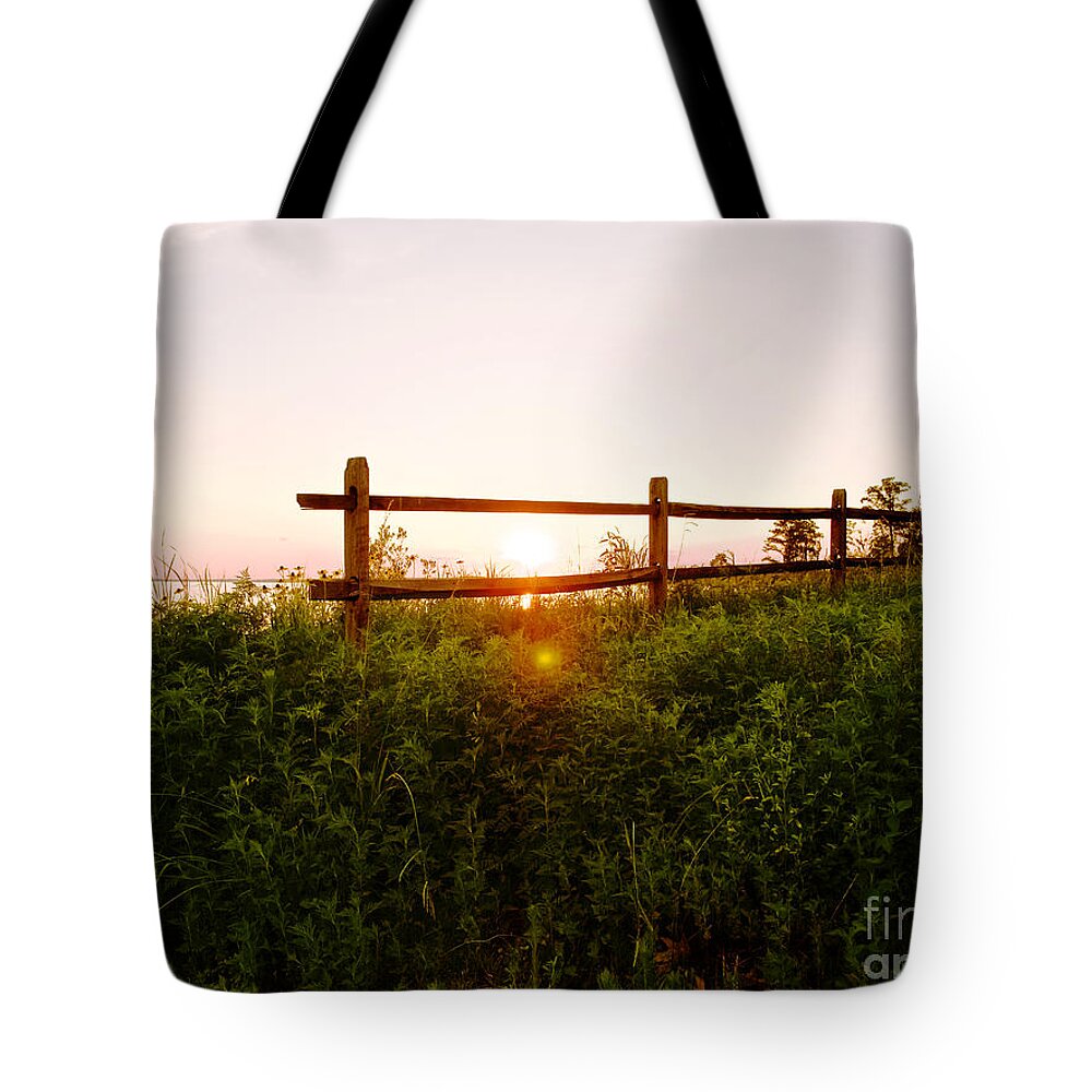 Fence Tote Bag featuring the photograph Sun Setting by Rachel Morrison
