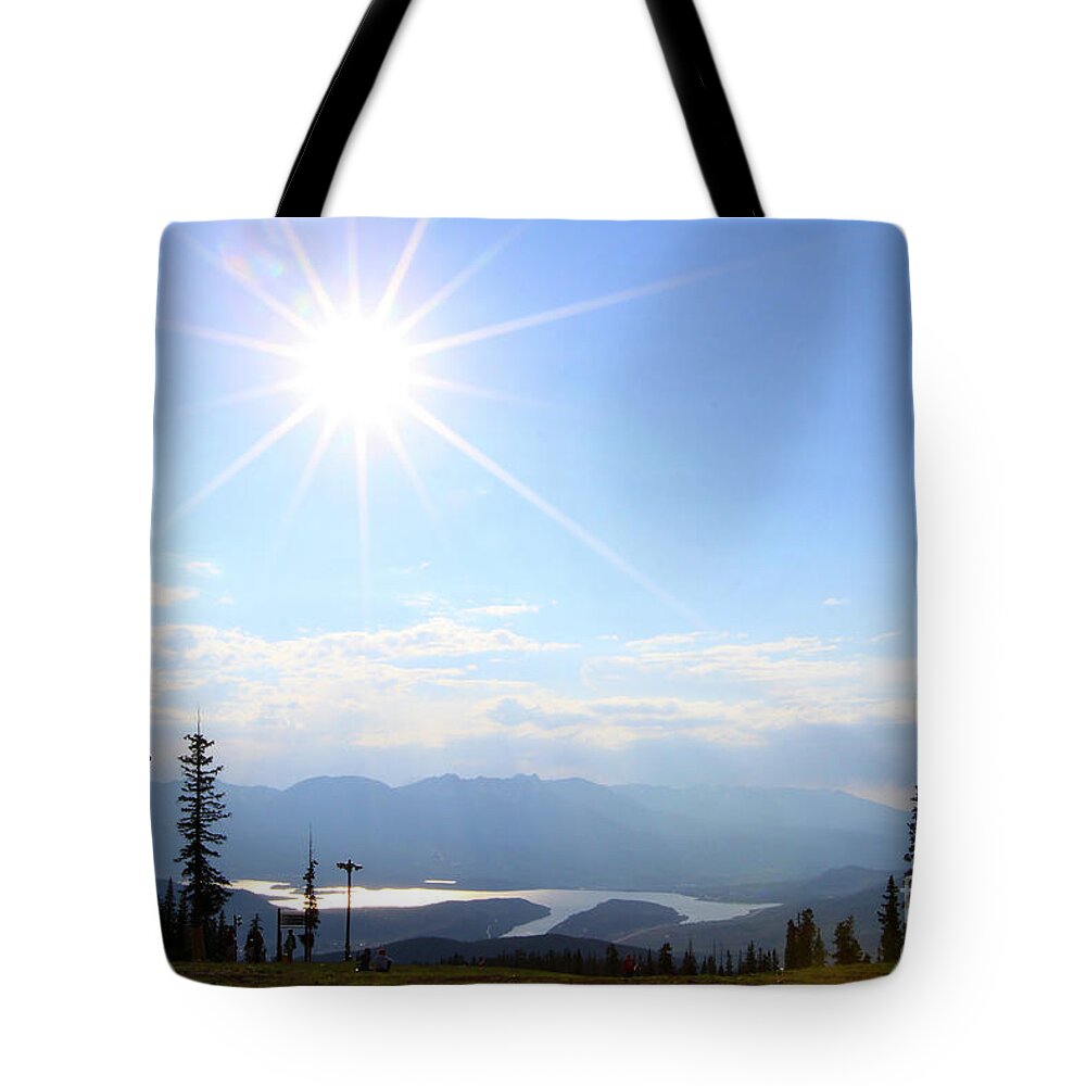 Sun Tote Bag featuring the photograph Sunburst over Lake Dillon by Paula Guttilla