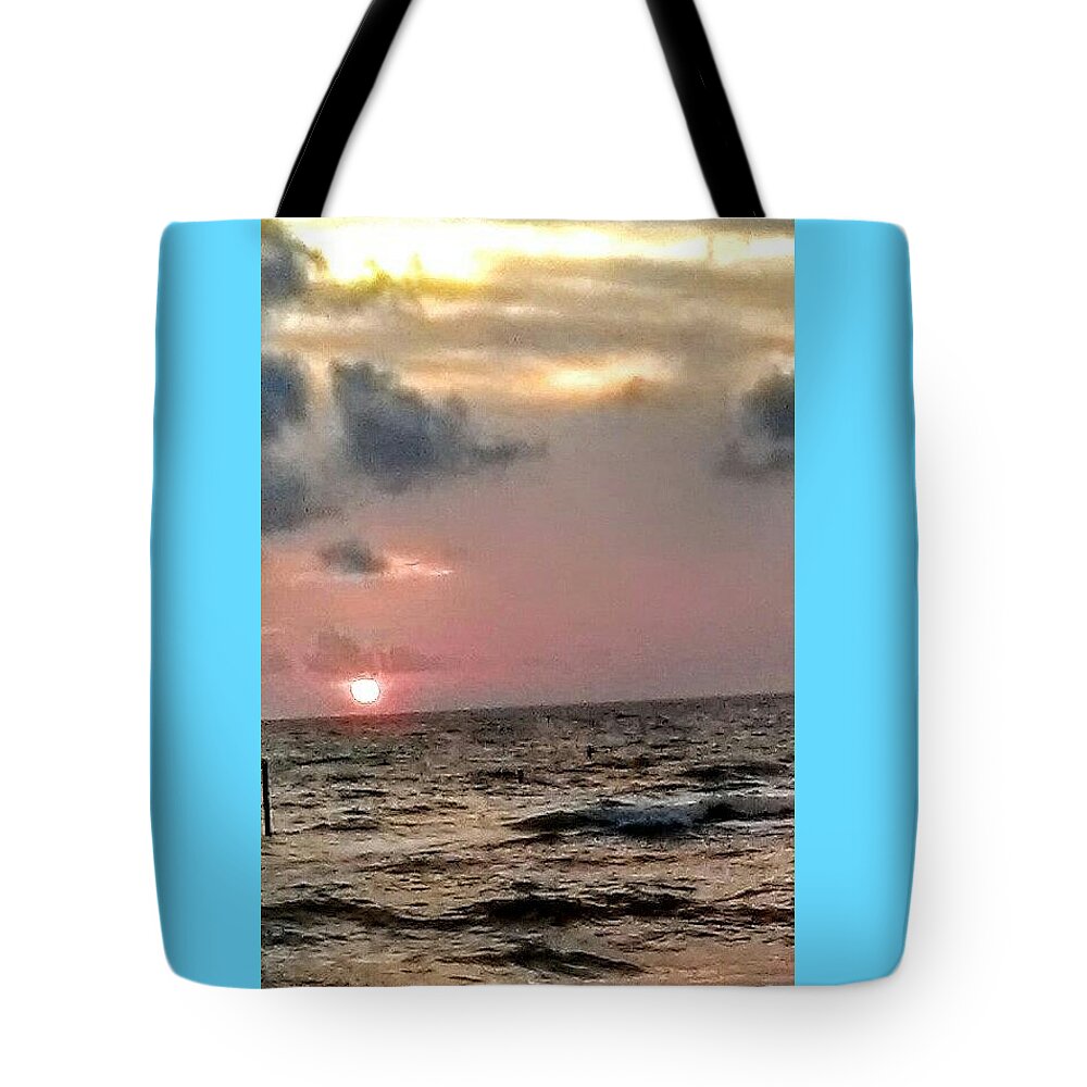 Clearwater Tote Bag featuring the photograph Sundown by Suzanne Berthier