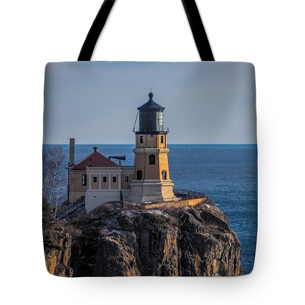 Split Rock Lighthouse Tote Bag featuring the photograph Sunlight On Split Rock Lighthouse by Paul Freidlund