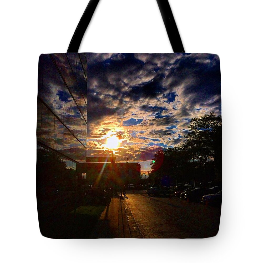 Clouds Tote Bag featuring the photograph Sunlit Cloud Reflection by Nick Heap