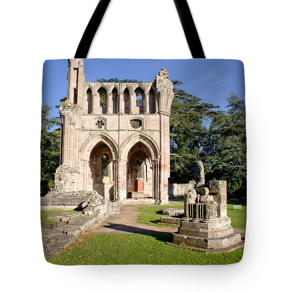 Dryburgh Tote Bag featuring the photograph Sunny afternoon in Dryburgh Abbey. by Elena Perelman