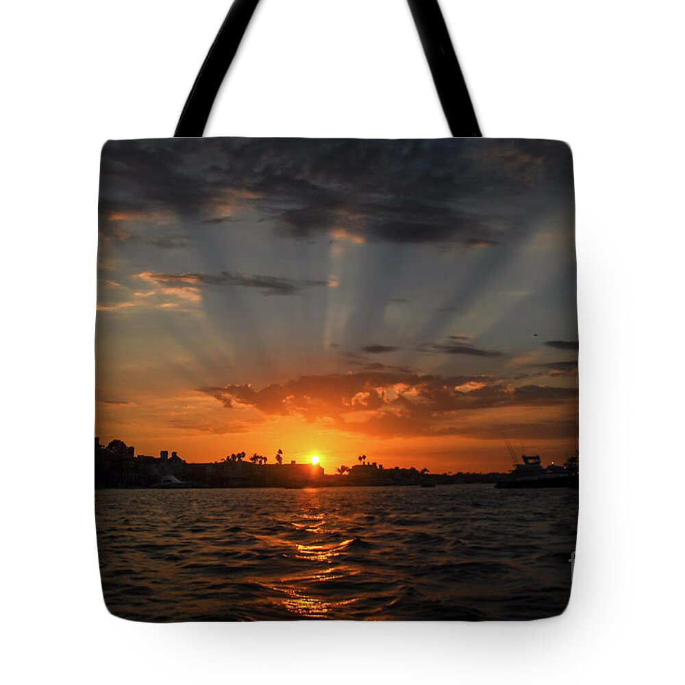 Sun Rays Tote Bag featuring the photograph Sunrays by Peter Dang