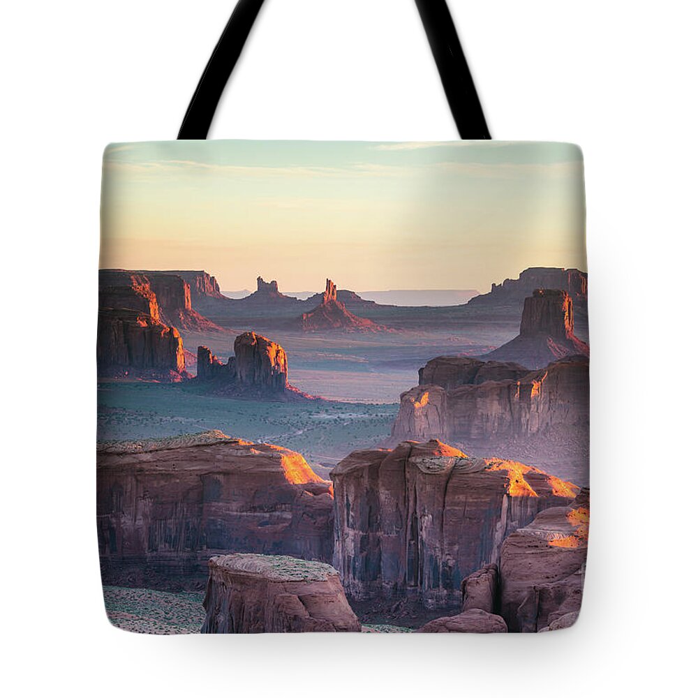 Monument Valley Tote Bag featuring the photograph Sunrise at Hunt's Mesa, Monument Valley, Arizona, USA by Matteo Colombo
