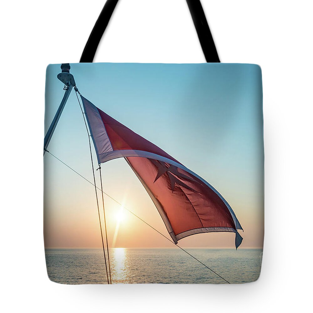 Aegis Tote Bag featuring the photograph Sunrise At The Horizont by Hannes Cmarits