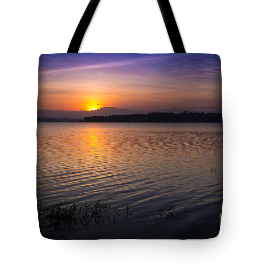Sunrise Tote Bag featuring the photograph Sunrise in Paoay Lake by Jonas Luis