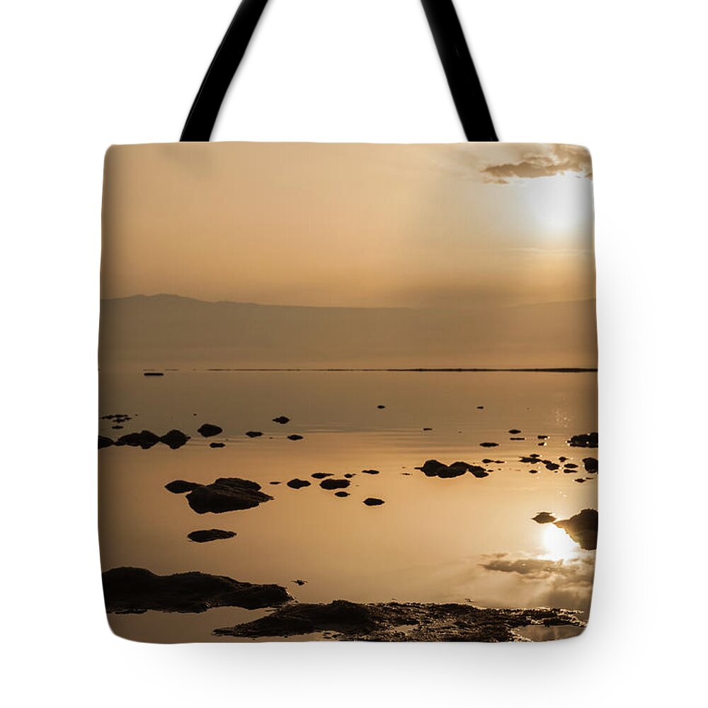 Sun Tote Bag featuring the photograph Sunrise on the Dead Sea by Sergey Simanovsky