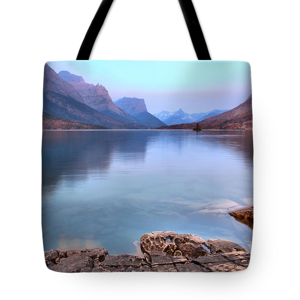 St Mary Tote Bag featuring the photograph Sunrise On The Eadge Of St. Mary Lake by Adam Jewell